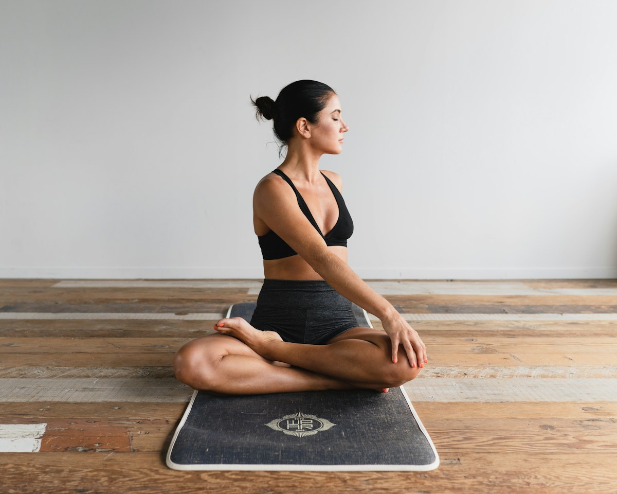 Practitioner in a standing yoga pose